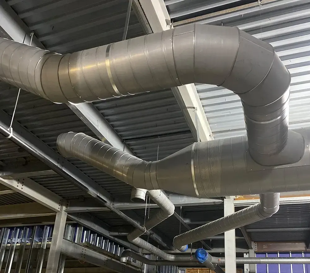 Exposed ductwork on industrial ceiling