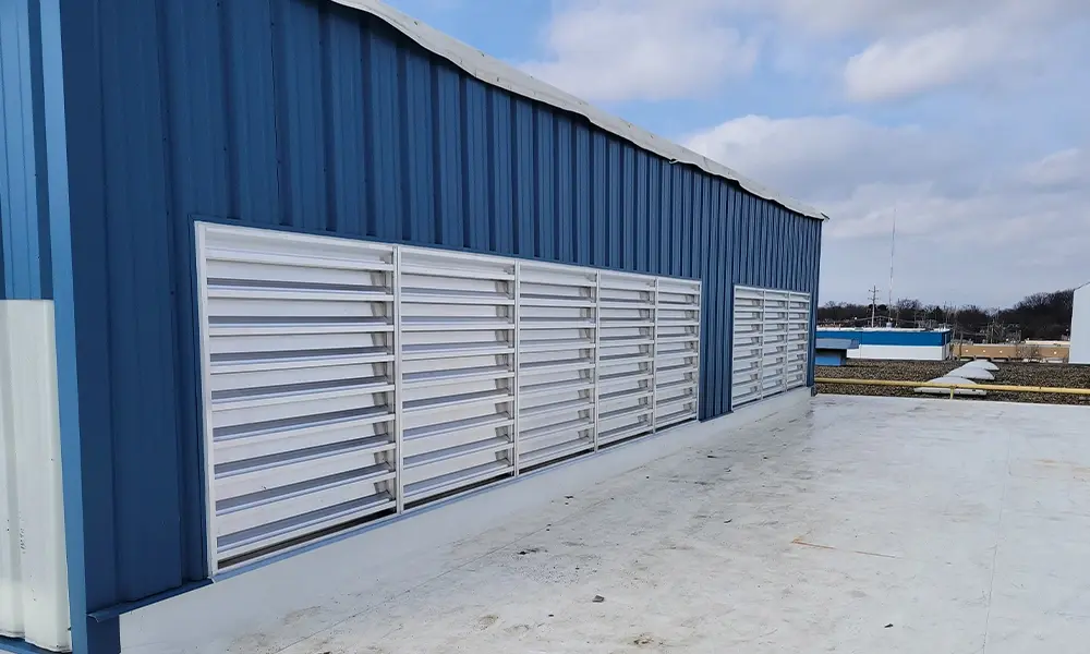 8 sheet metal doors on the side of a commercial building Installation Services